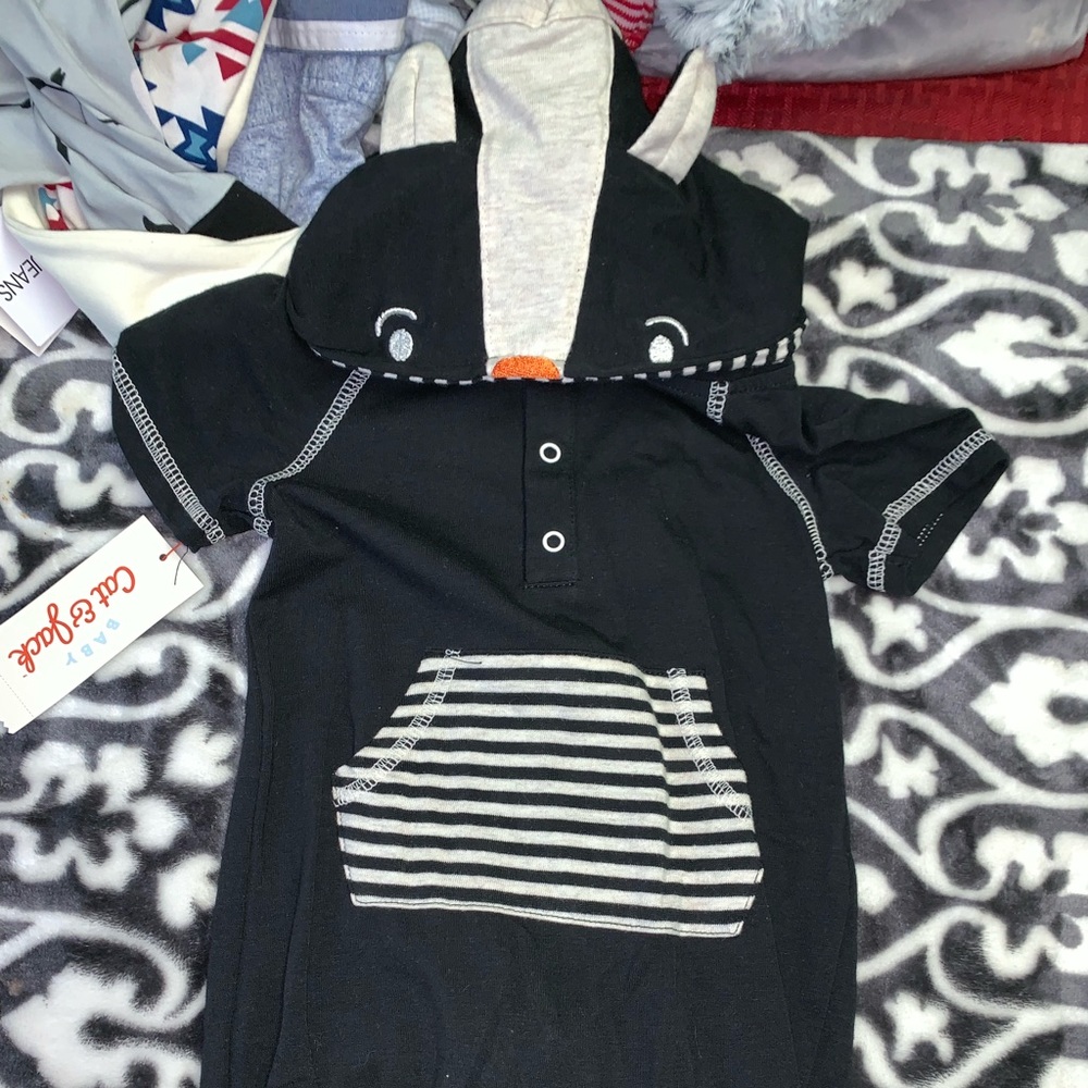 Baby skunk onesie